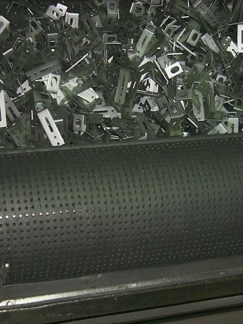 Bandas de granalladora, pieza de acero